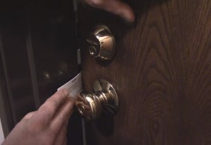 Push the card between the door lock
